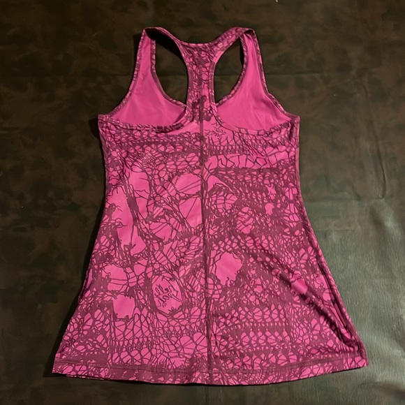 Two like new Nike dri-fit tank tops. Women’s size small - Picture 3 of 4